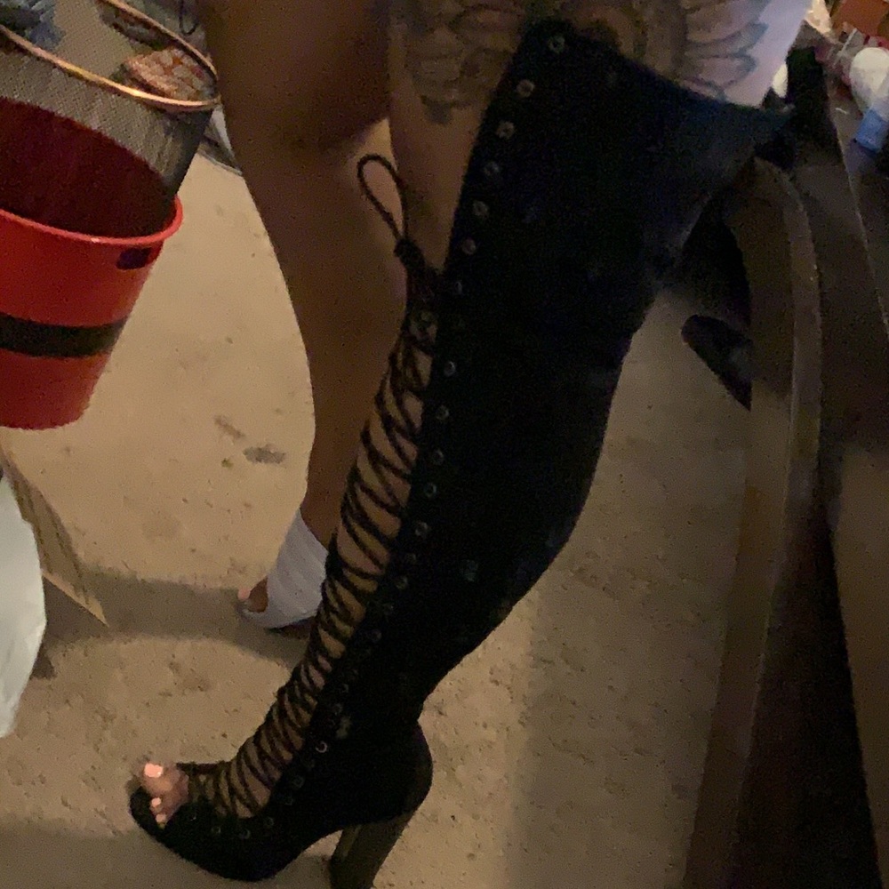 Laced thigh high boots